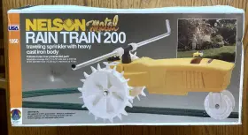 Nelson 077855818609 Rain Train 200 Metal Cast Iron Traveling Sprinkler Nos 1860