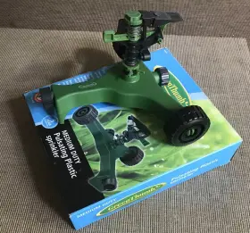 583585 Orbit Underground Green Thumb Medium Duty Pulsating Plastic Sprinkler Adjustable 5 000 Sqft Cover