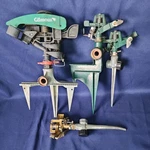 Lot Of 4 Melnor, Orbit, Gilmour Impact Garden Sprinklers Metal Spike Used. Price: $34.96.