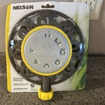 Nelson Eight-pattern Spray Head Stationary Sprinkler Metal Base New. Price: $28.00.