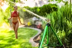Orbit 56667N Zinc Impact Sprinkler On Tripod Base - Green New. Price: $45.95.