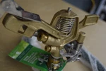 Orbit 3/4" Brass Impact Sprinkler On Metal Base 58643-30, New. Price: $42.95.