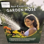Garden Hose 100FT, Non-expanding, Lightweight With 8 Function Nozzle New. Price: $49.99.