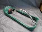 Gilmour Adjustable Oscillating Sled Lawn Sprinkler Used. Price: $12.00.