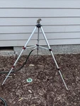 Husky Metal Pulsating Sprinkler With Tripod Open. Price: $35.00.