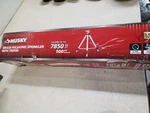 Husky Metal Pulsating Sprinkler W/ Tripod Open. Price: $40.00.