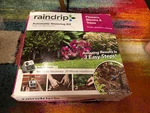 Raindrip Automatic Watering Kit Irrigation Brand New Box, Is Bent Up. Price: $45.00.
