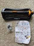 Melnor Xt Turbo Oscillating Sprinkler 65167AMZ Adjustable 4500FT Black Orange Open. Price: $25.00.