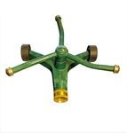 Green Metal Revolving 3-ARM Rotary Sprinkler W/ Wheeled Base Used. Price: $12.96.
