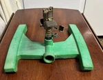 Melnor Rotary Sprinkler: Plastic Base,brass SPRINKLER-9.75 Wide & Long 5.5 Tall Used. Price: $30.00.