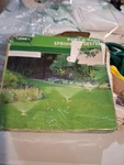 Orbit 58092N Port-a-rain Hose Watering Sprinkler System Open. Price: $35.95.