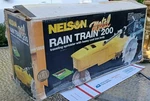 Nelson 1860 Train" Cast Iron Tractor Traveling Lawn Yard Sprinkler Nib New. Price: $70.00.