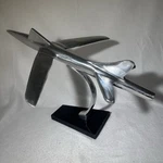 Nelson Pine Industries 2013 Mid Century Modern Chrome Jet Plane Wood Base Decor Used. Price: $69.99.